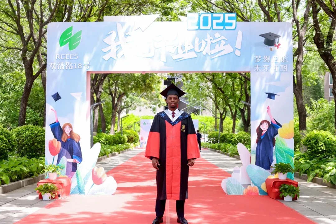 Principal Peter in his doctoral graduation gown